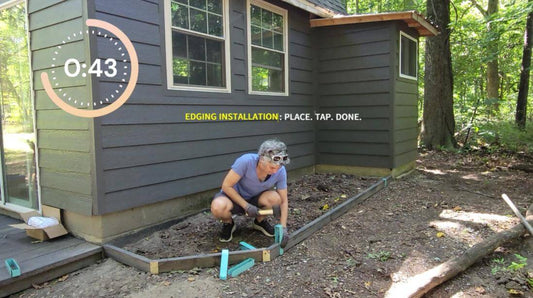 A woman installing 2x4 lumber with 2xEDGE Robins Egg Blue lumber staples.