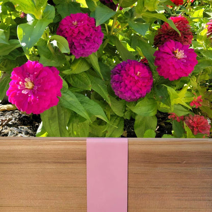 Rose Pink 2xEDGE Staple installed on 2x4 lumber as wood garden edging