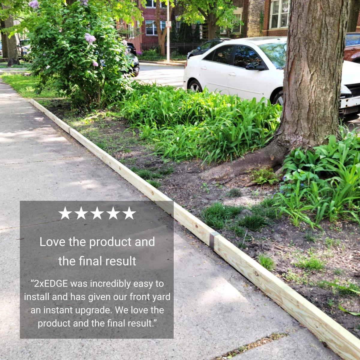 2x4 lumber sidewalk edging along a curbside flower bed, running toward a street tree.
