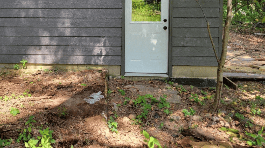 An artist studio entryway before and after. Before: the front door is white and there are no garden beds. After: the front door is Robins Egg Blue to match Robins Egg Blue 2xEDGE Staples and 2x4 edging stained a dark walnut contains a planted and mulched entryway garden.